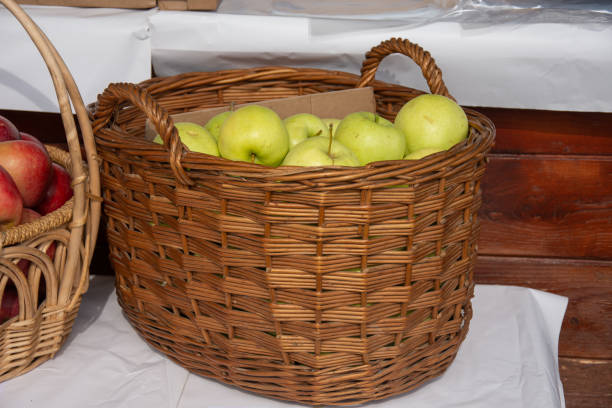 green  Apples in a cardboard box