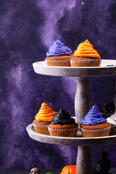 istock Halloween cupcakes with color cream 1726597020