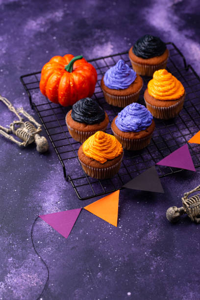 istock Halloween cupcakes with color cream 1726598133