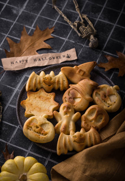 istock Halloween muffins in shape of bat and ghost 1726598672