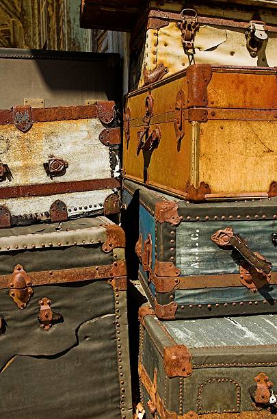 istock Antique trunks and suitcases stacked vertically 172660692