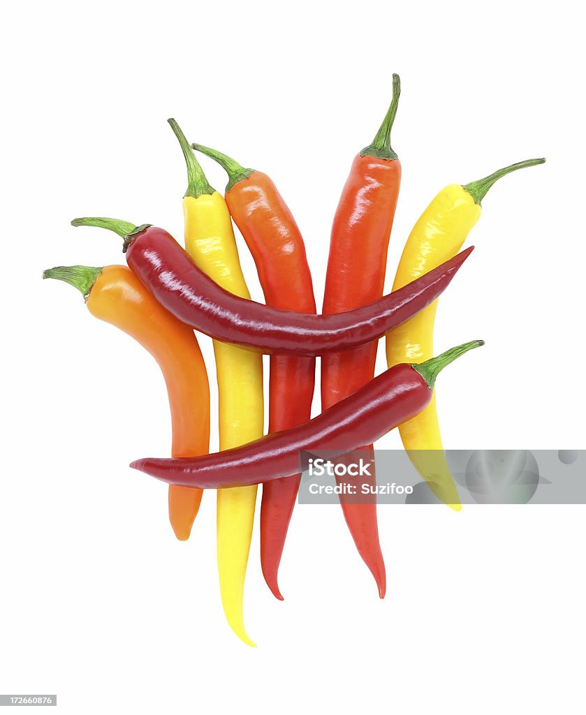 chili peppers "Three different colors of chili peppers, isolated on white." Bunch Stock Photo