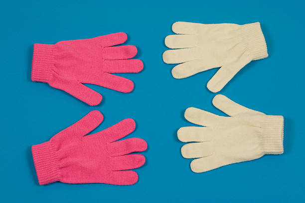 istock Warm Winter Gloves on a Blue Background 172661128