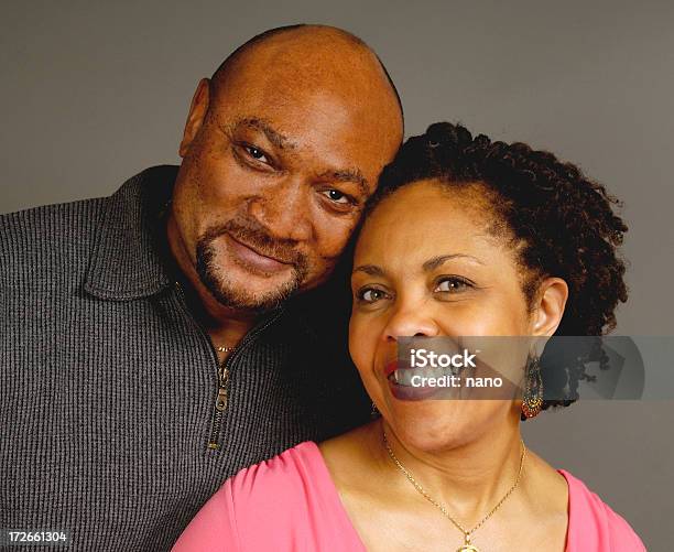 Portrait Of A Happy Couple Leaning On Each Other Stock Photo - Download Image Now - African Ethnicity, African-American Ethnicity, Couple - Relationship