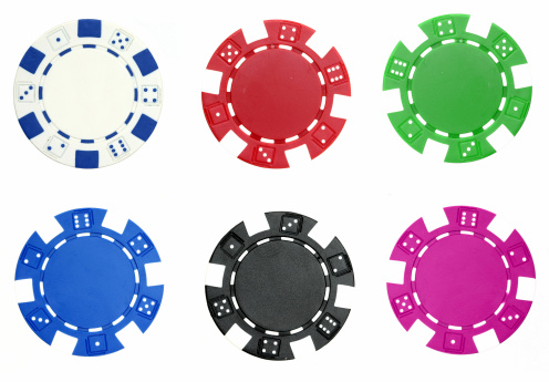 Set of multi-colored poker chips. Isolated on a white background. Gambling. Design element.