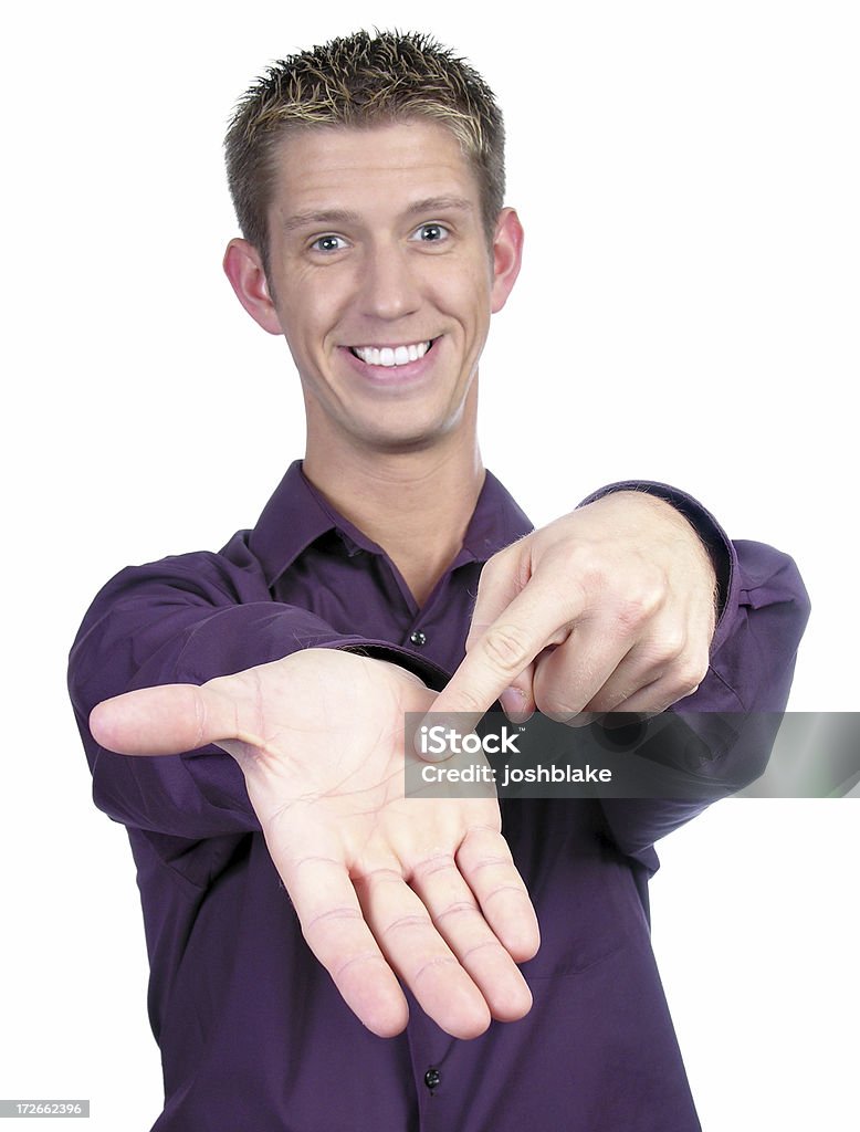 Pay Up! casual businessman points to hand Palm of Hand Stock Photo