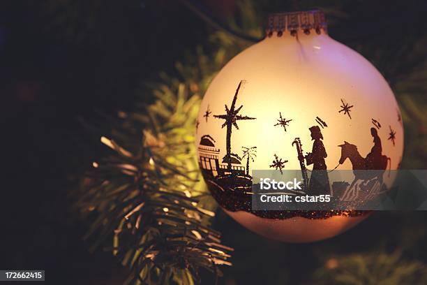 Religious Nativity Scene Silhouette On Christmas Ornament Stock Photo - Download Image Now