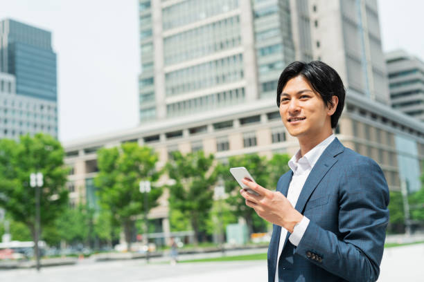 istock Young businessman commuting through a building district 1726626186