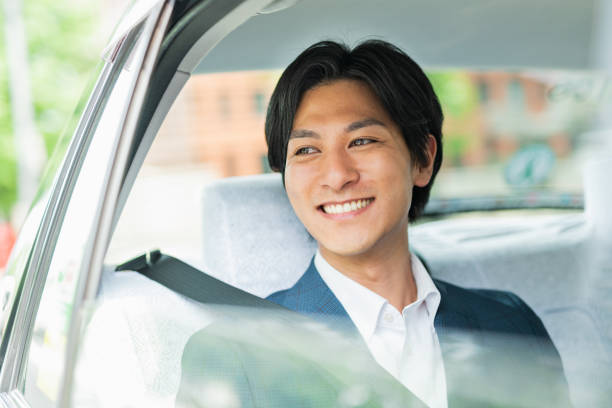 istock Young businessman in a cab 1726629553