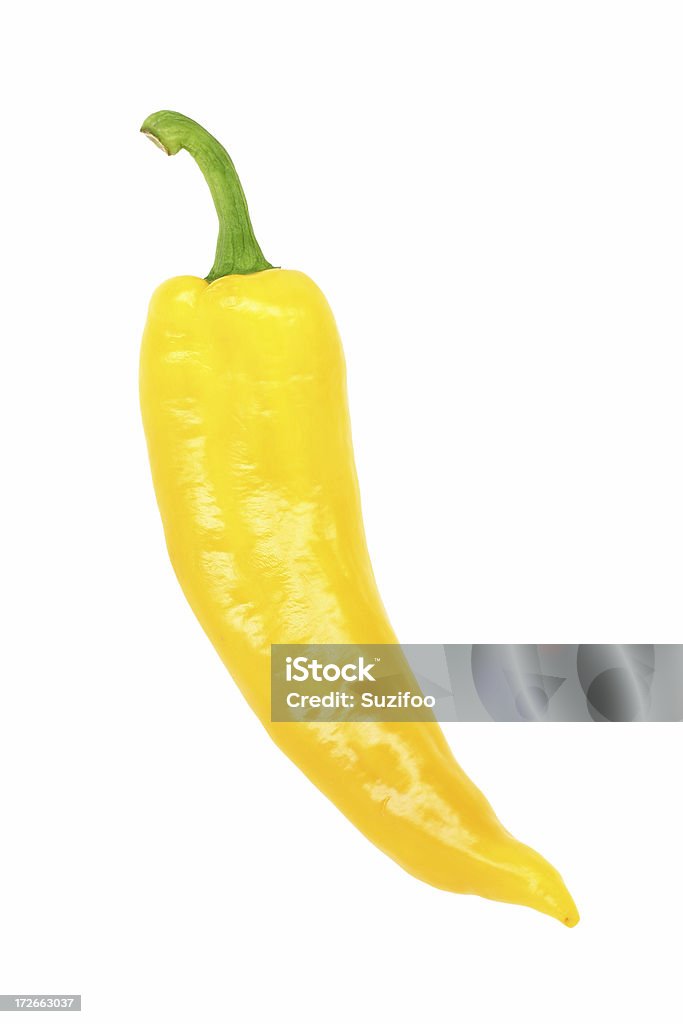 long yellow Italian sweet pepper "A long skinny mild yellow pepper, isolated on white." Cut Out Stock Photo