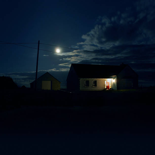House in the Night House in the night lit by the moon full moon photos stock pictures, royalty-free photos & images