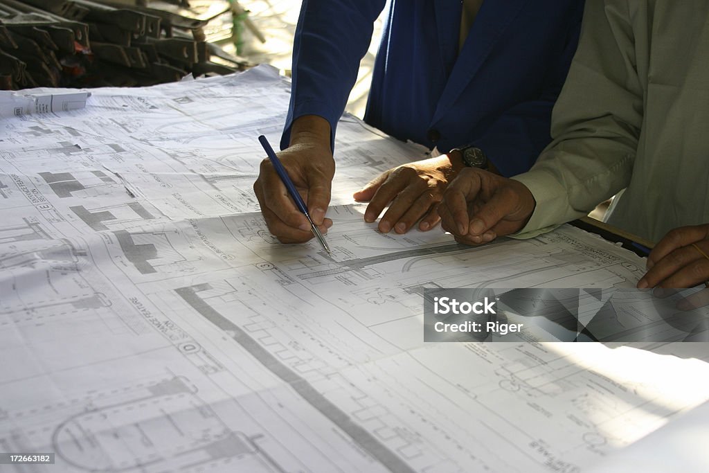 Architects 2 Architects on site with plan Architect Stock Photo