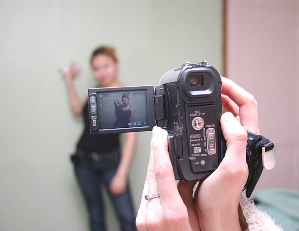 Video girl Taking a video of a girl. audition photos stock pictures, royalty-free photos & images
