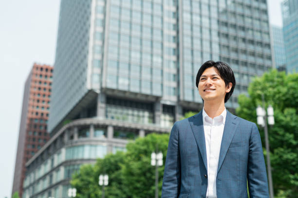 istock Young businessman commuting through a building district 1726633281