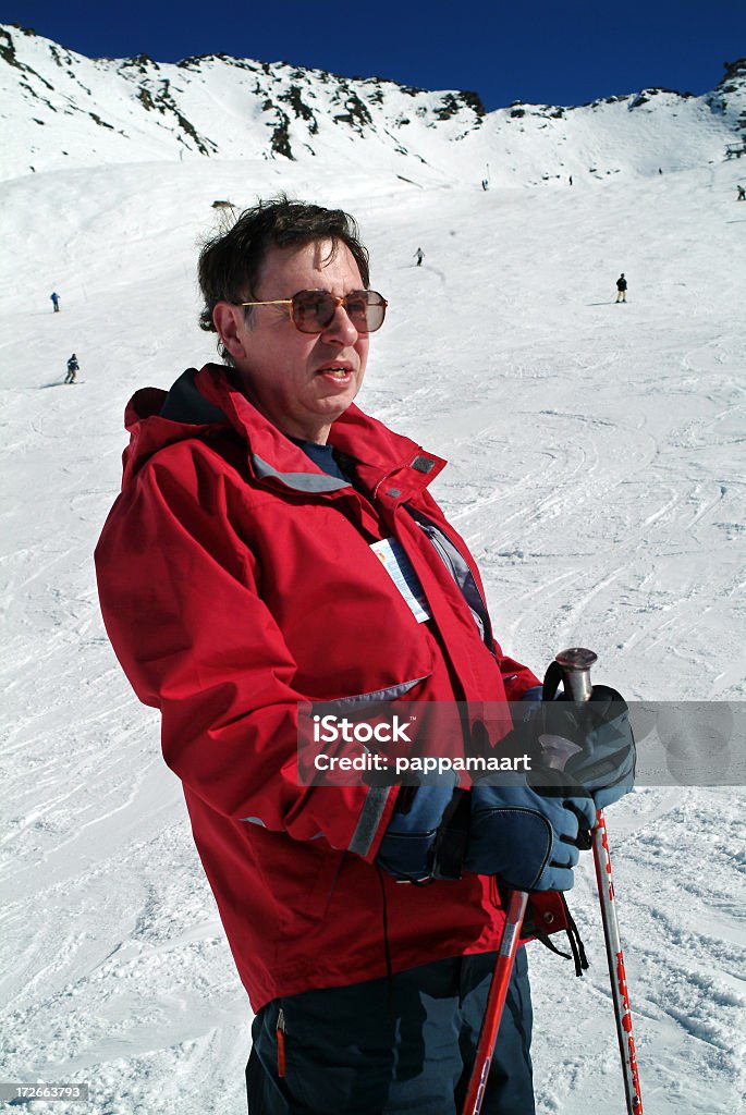 Rest during skiing He was really tired! Skiing Stock Photo