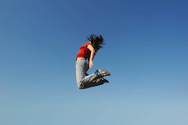 istock jumping in the sky - 8 172664153