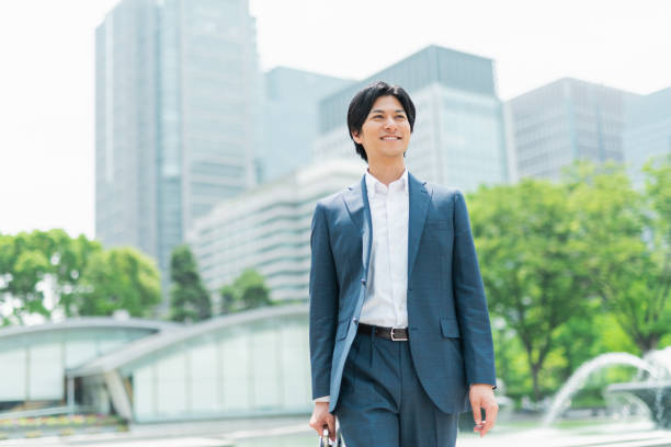 istock Young businessman walking in the park 1726647348