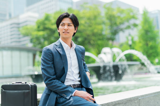 istock Young businessman taking a break in the park 1726648442
