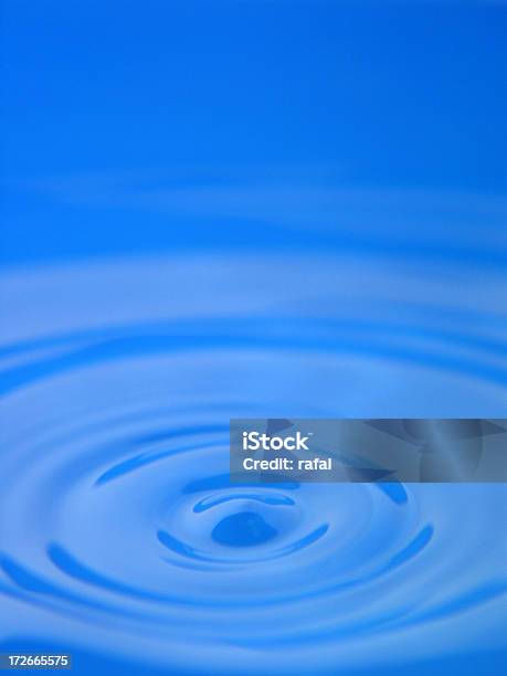 Water Drop And Smooth Ripples Stock Photo - Download Image Now - Backgrounds, Blue, Concepts