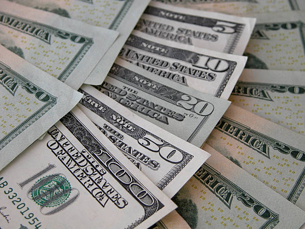 istock Fanned US Money Bills 172665731