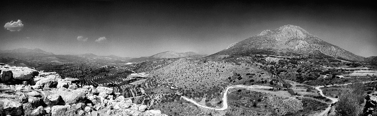 Black and white panorama shot of a landscape in Greece. Preview on this page is a little small.