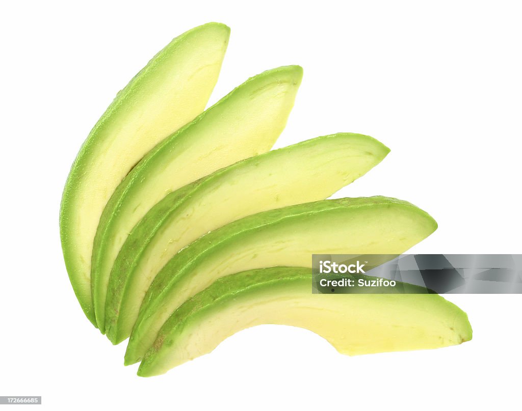 avocado fette - Foto stock royalty-free di Avocado