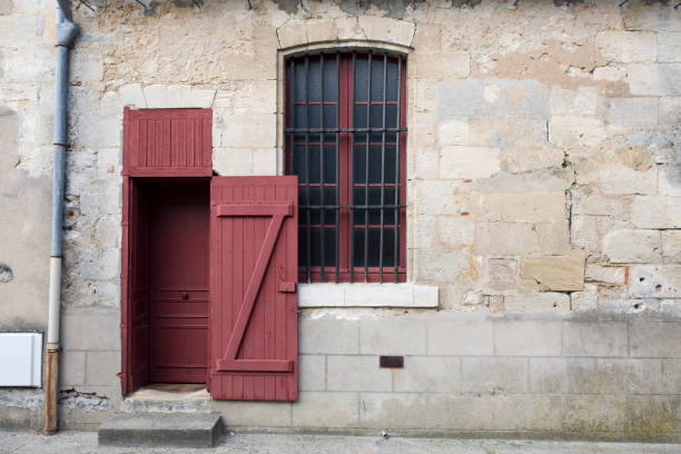 Rustic window and door in the town of Locronan located in the Brittany area of France