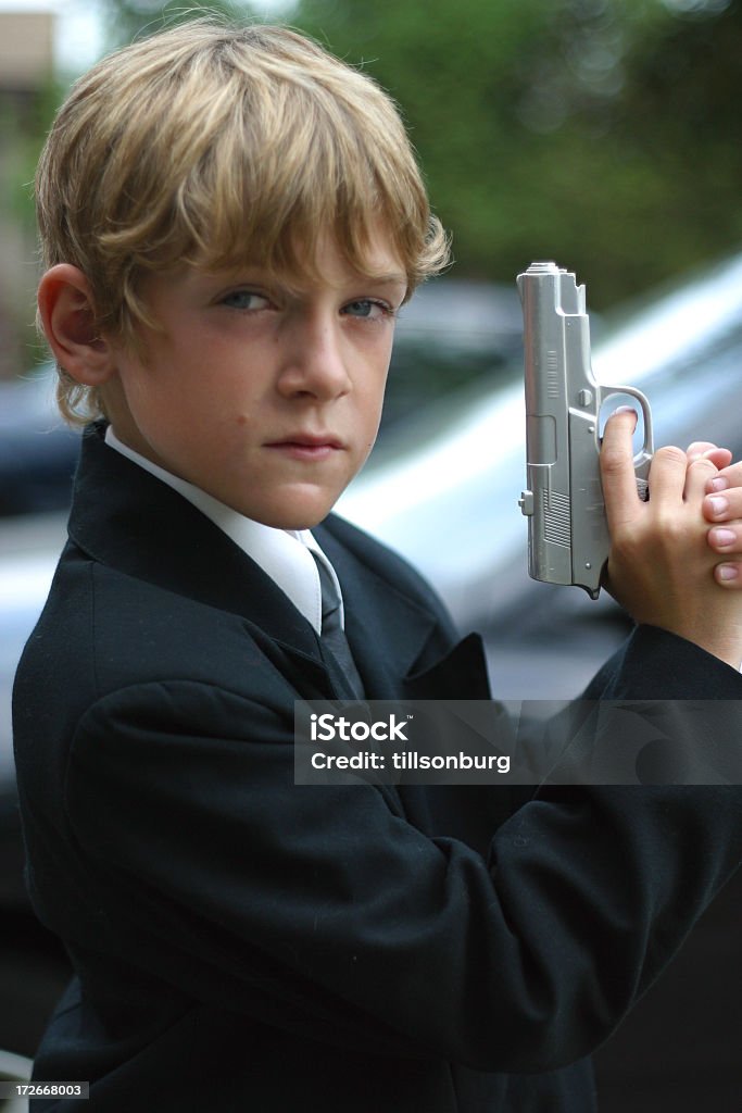 Agente segreto ragazzo - Foto stock royalty-free di Arma da fuoco