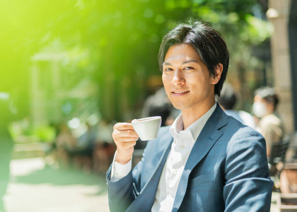 istock Young businessman drinking coffee at a cafe 1726682290