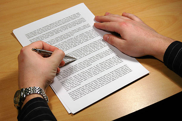 Check a Document with pen stock photo