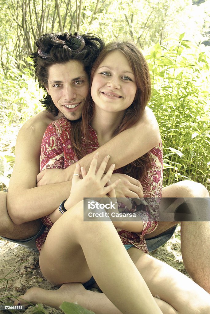 Happy couple on vacation Vacation, couple holding each other Activity Stock Photo