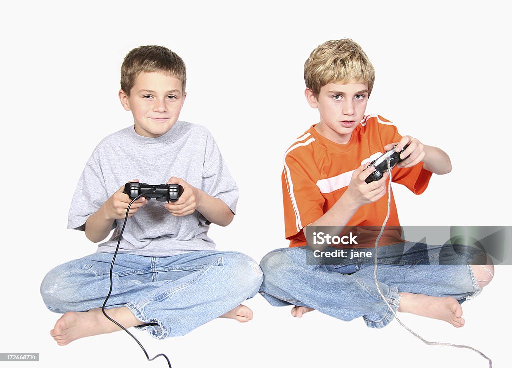 Irmãos jogando vídeo Game - Foto de stock de Videogame royalty-free