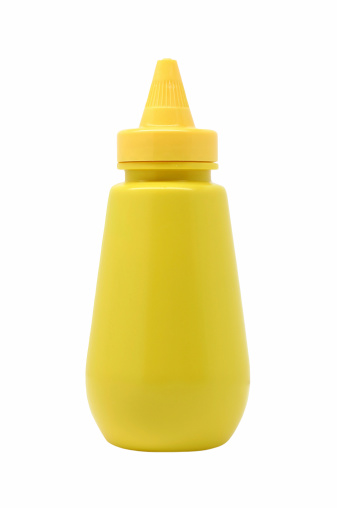 A plastic bottle of yellow mustard. Please note the plastic cap is a slightly different shade of yellow than the bottle (I didn't change this, that's how it was). Isolated on white. Part of my sandwich ingredients series. 