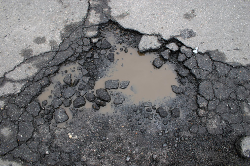hole in the road shot on overcast day