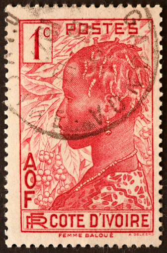 Ivory Coast postage stamp, African woman.