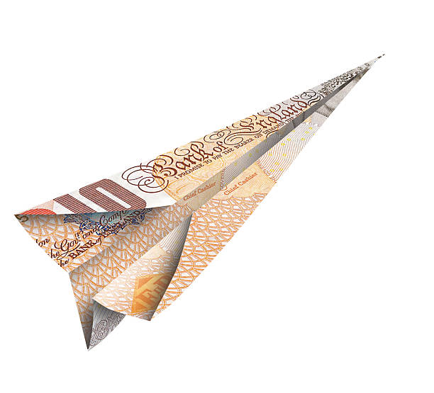 ten pound note flying right stock photo