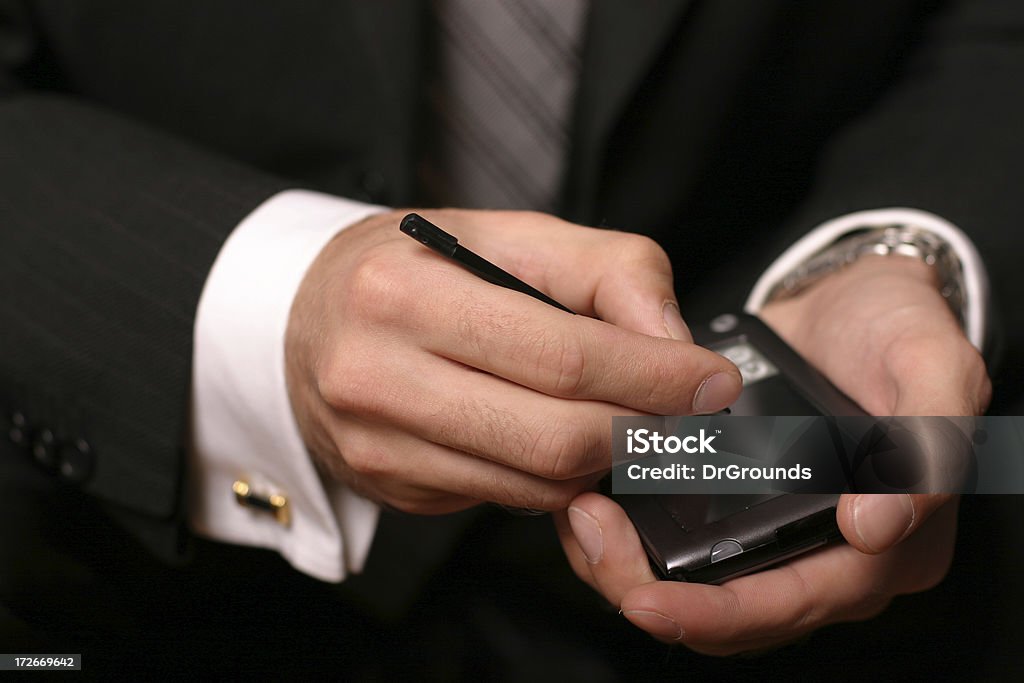 Business hands Businessman working on his pds, hands close-up. Adult Stock Photo