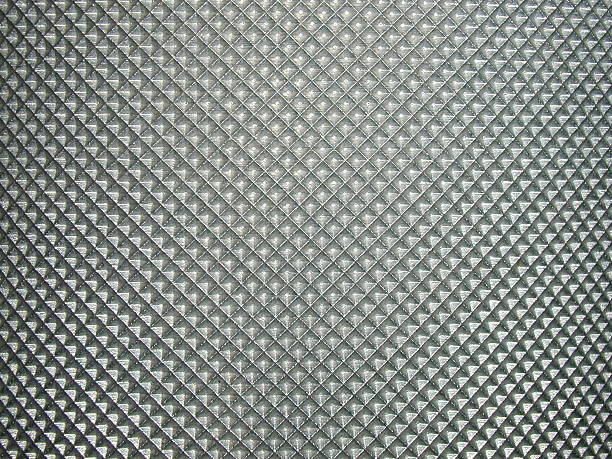 Metal grid with a diamond pattern stock photo