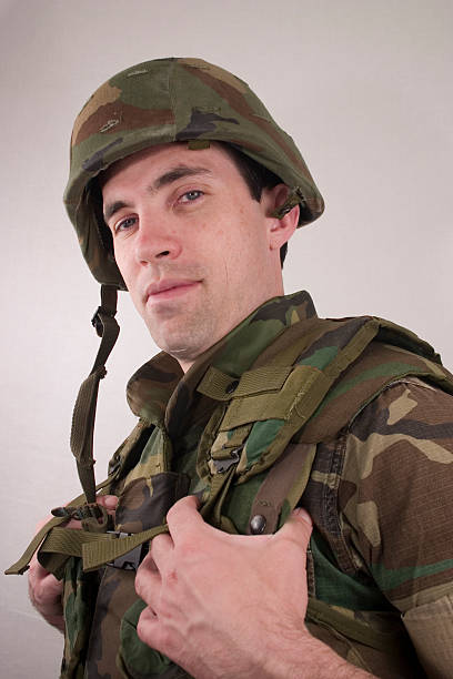 istock marine in battle gear smiling 172669823