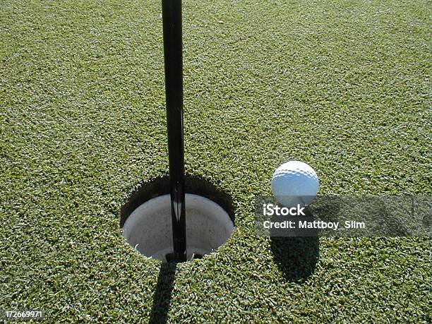 Close Up Of Golf Ball And Cup Stock Photo - Download Image Now - Hole, Next To, Sports Ball