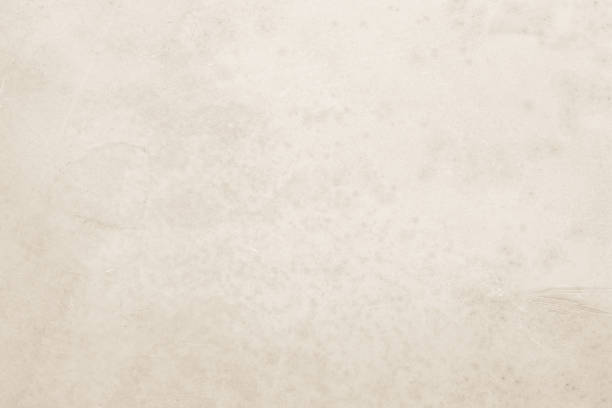 istock Colour old concrete wall texture background. Close Up retro plain cream color cement wall background texture. Design paper vintage parchment element show or advertise or promote product on display. 1726702249