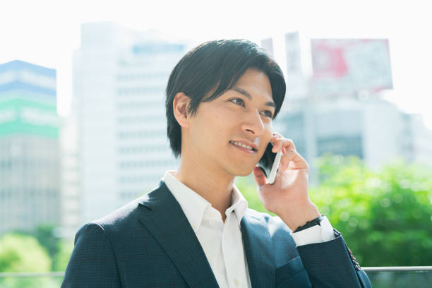 istock Young businessman making a phone call at a train station 1726703332