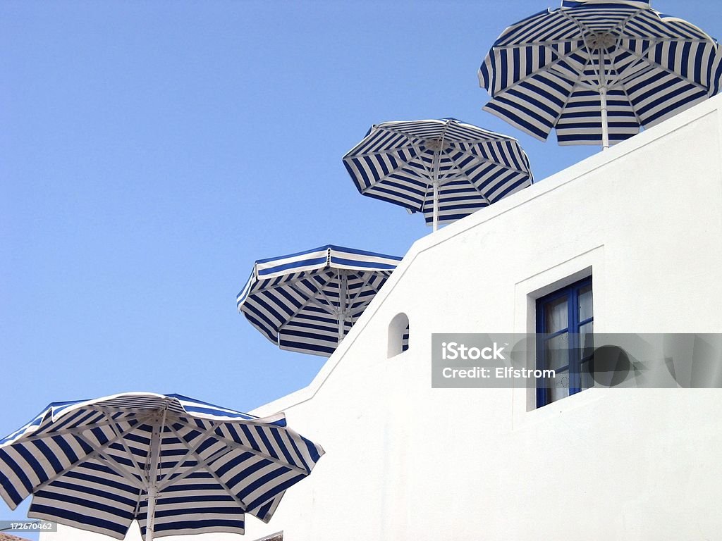 Vier Sonnenschirme - Lizenzfrei Insel Santorin Stock-Foto