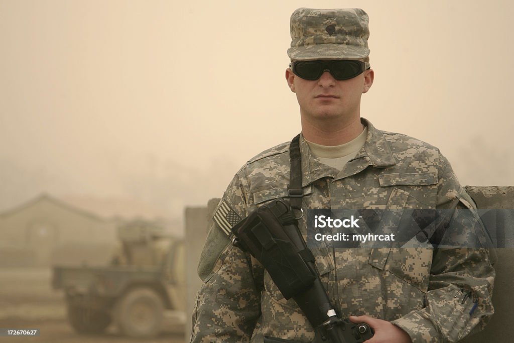 Soldier in a Sandstorm "A guy in my army unit in a sandstorm in Baghdad, Iraq." Iraq War 2003-2011 Stock Photo