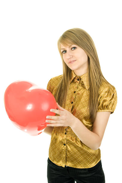 istock attractive young Caucasian woman with red heart shape baloon 172671221