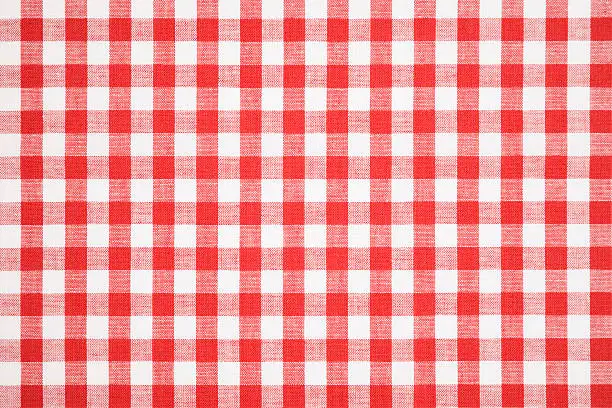 Tablecloth made of linen with red and white pattern.Perfect underground/background to put your dish or steak on.can be found in every kind of restaurant.