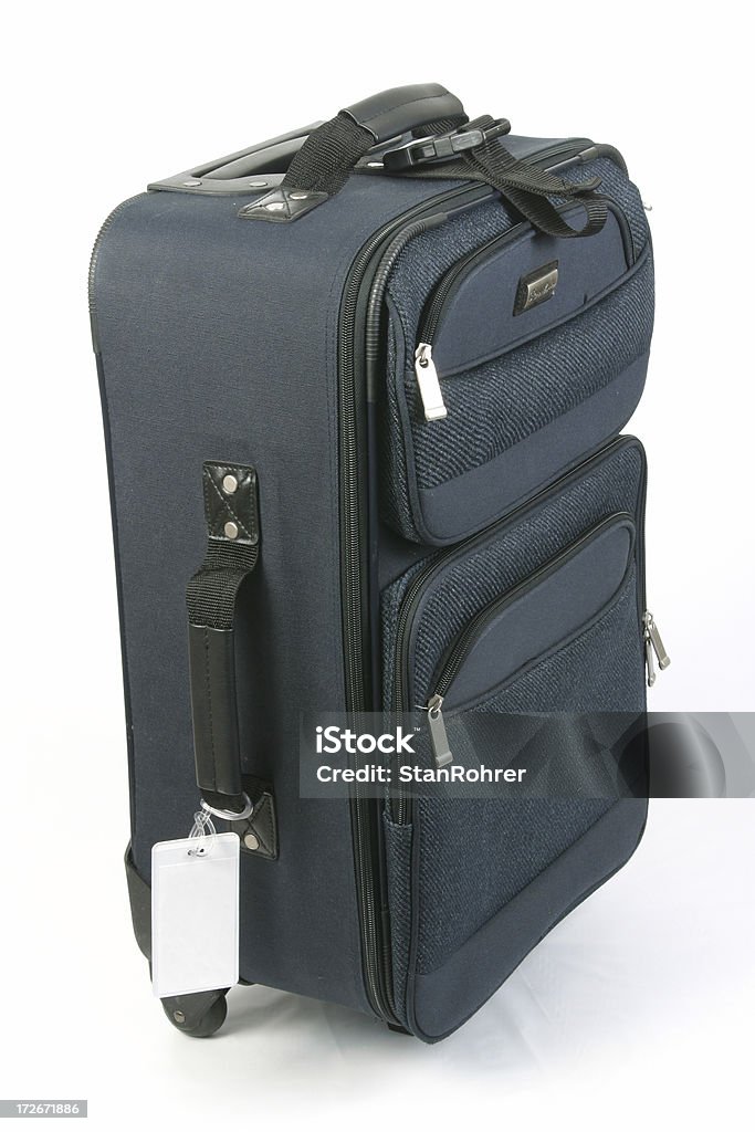 Equipaje con etiqueta en blanco cerca de la parte inferior, Suitcsase, bolsa de transporte - Foto de stock de Equipaje libre de derechos