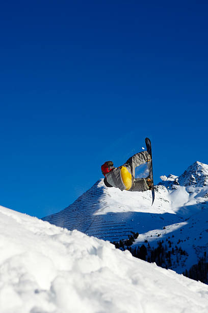 snowboarder in the air stock photo