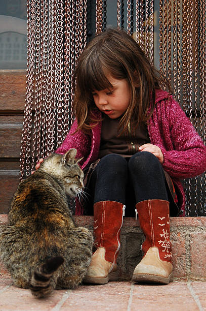 istock Girl and cat 172672585