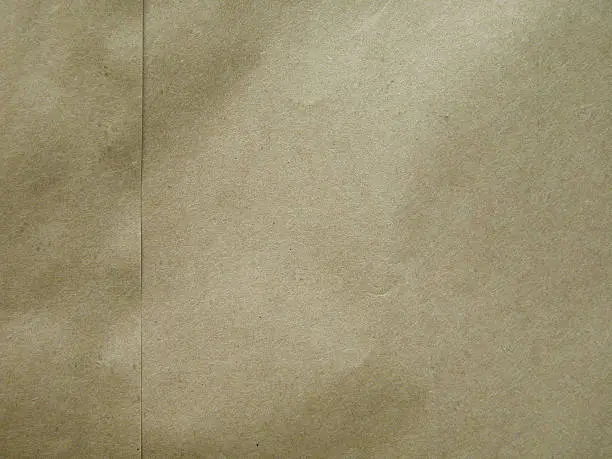 Brown paper bag texture suitable for your next background.